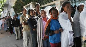 Eritreans stand