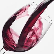 Red Wine Pouring Into Glass
