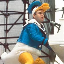 Elton John Calls For Ban on Religion