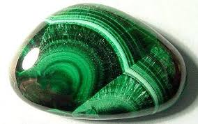 A polished piece of real malachite ...