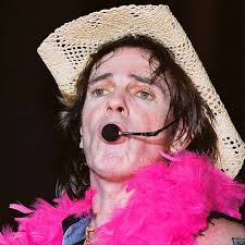 Pink boa and a cowboy hat!